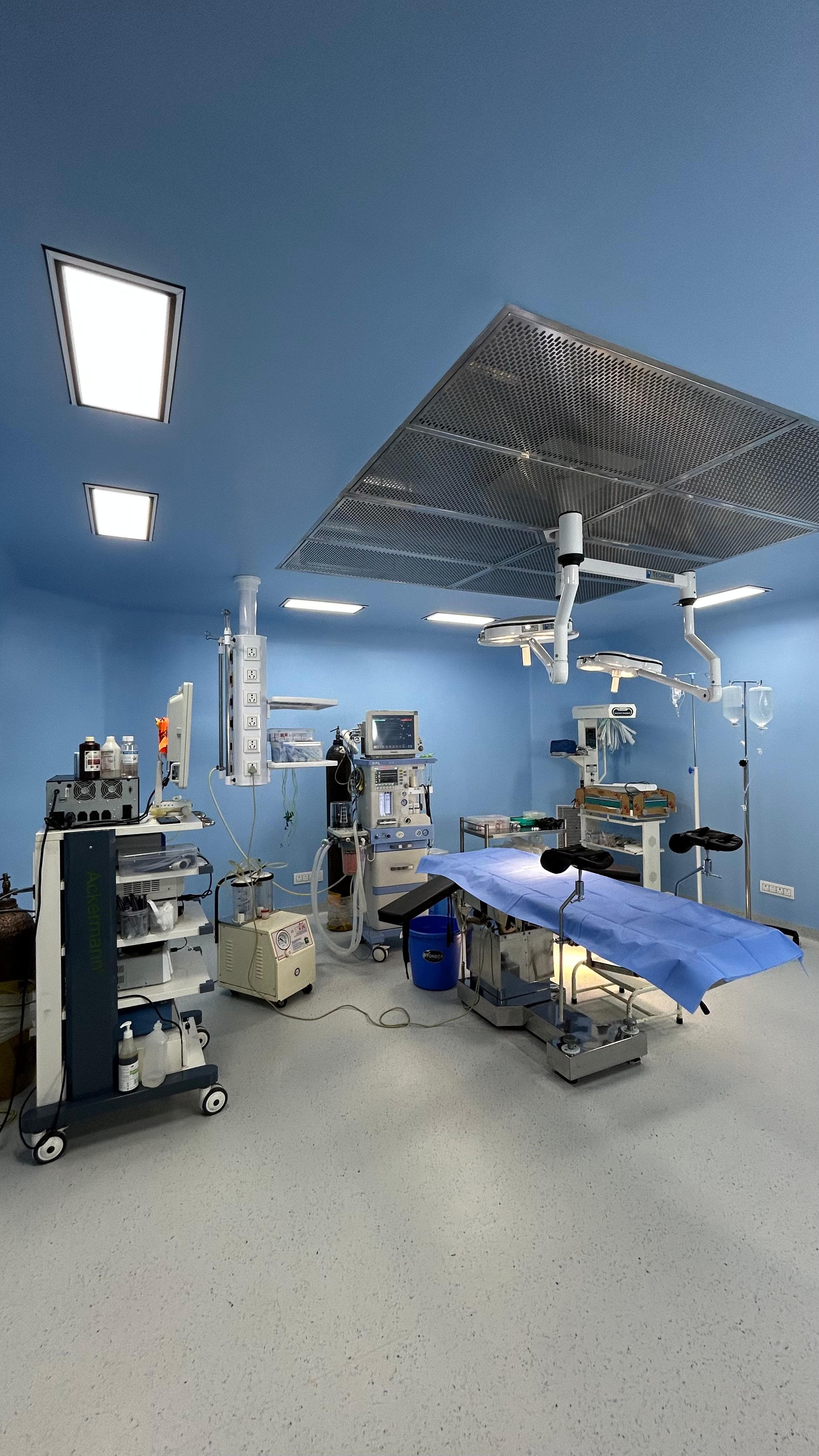 Modern modular operating theatre with surgical lights